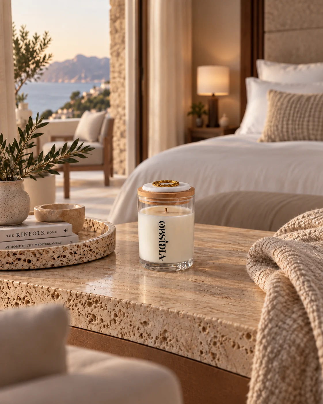 OBSIDIA AUREA candle in a Mediterranean hospitality interior